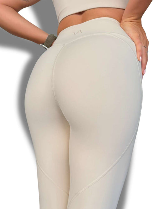Legging deportivo mujer vista perfil, tejido mate squat-proof